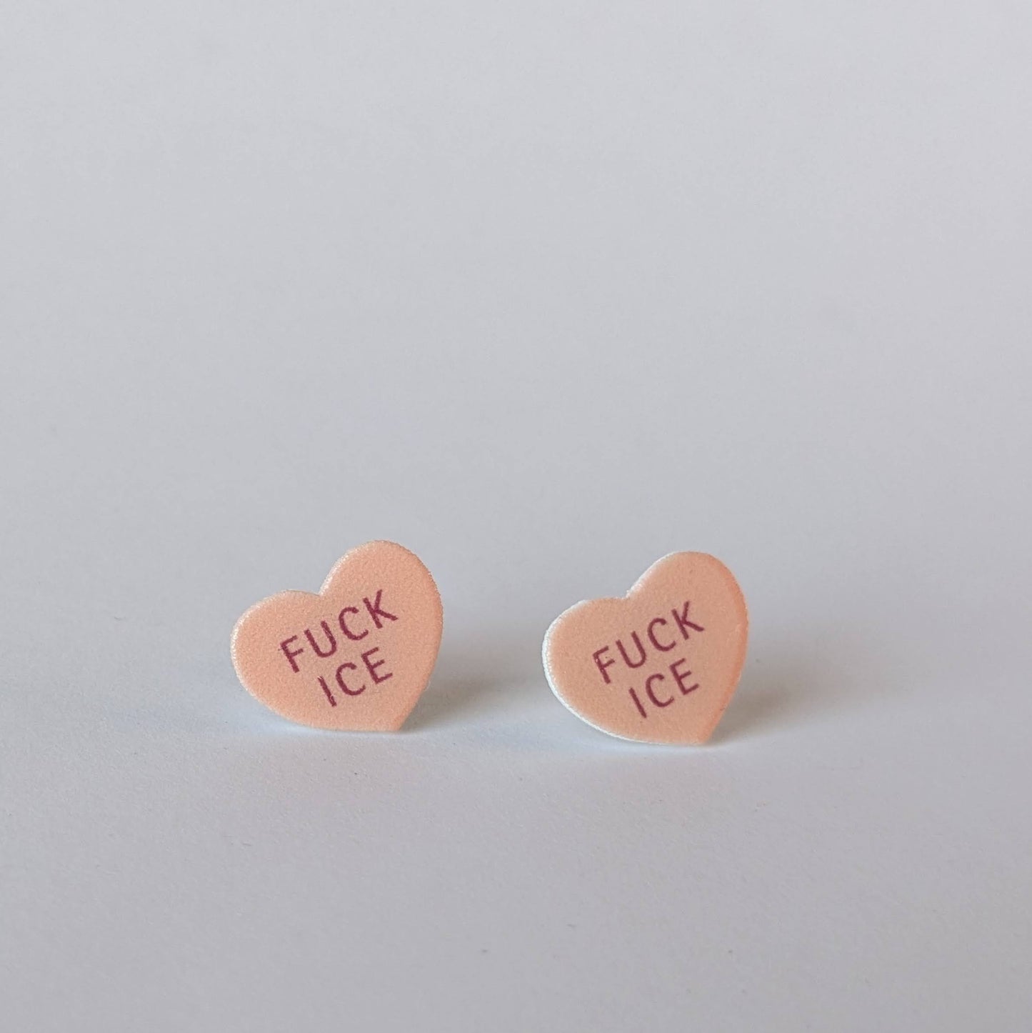 Conversation Heart "FUCK ICE" earrings in orange or blue