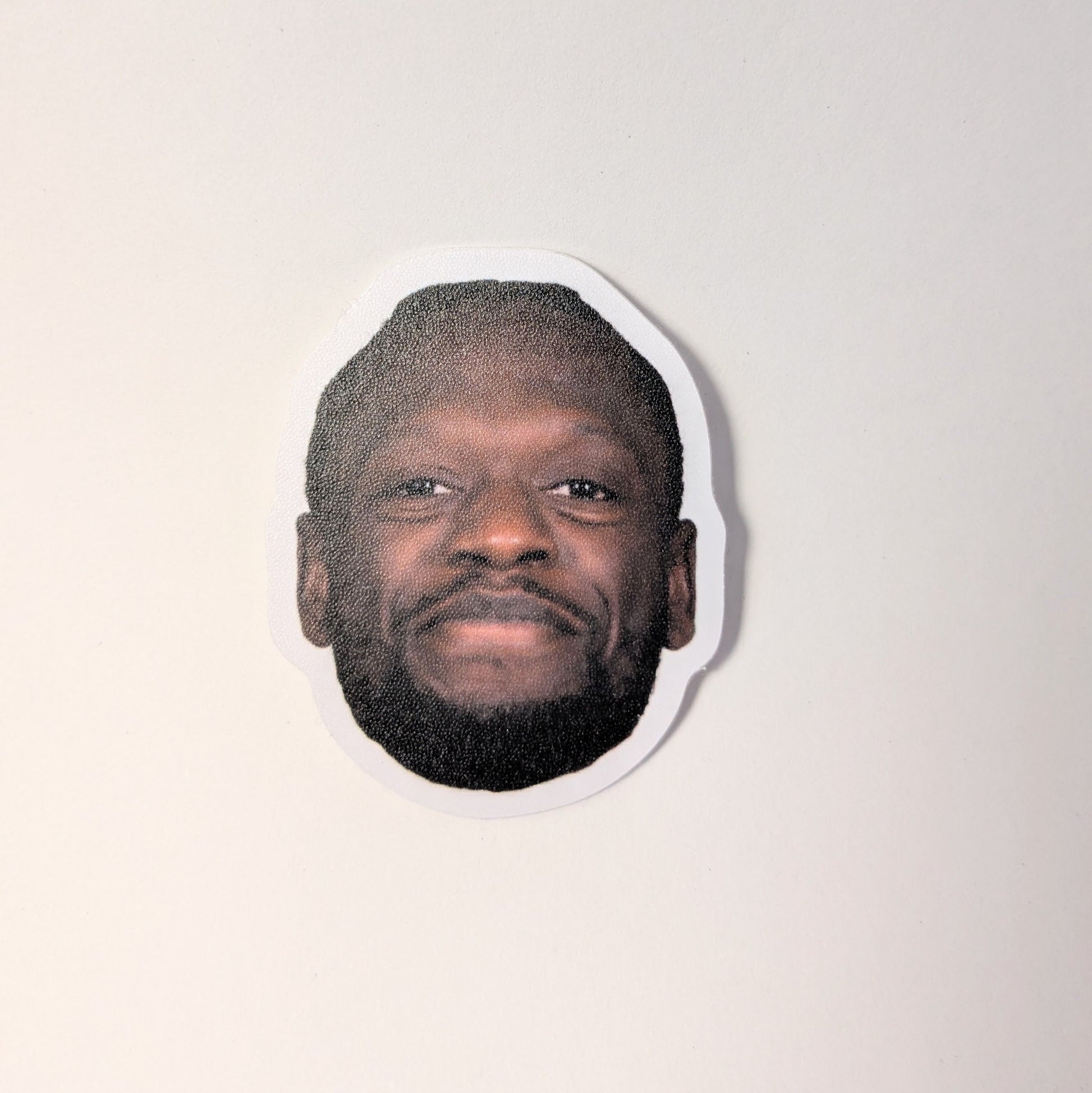 Cutout of a person's face on a white background
