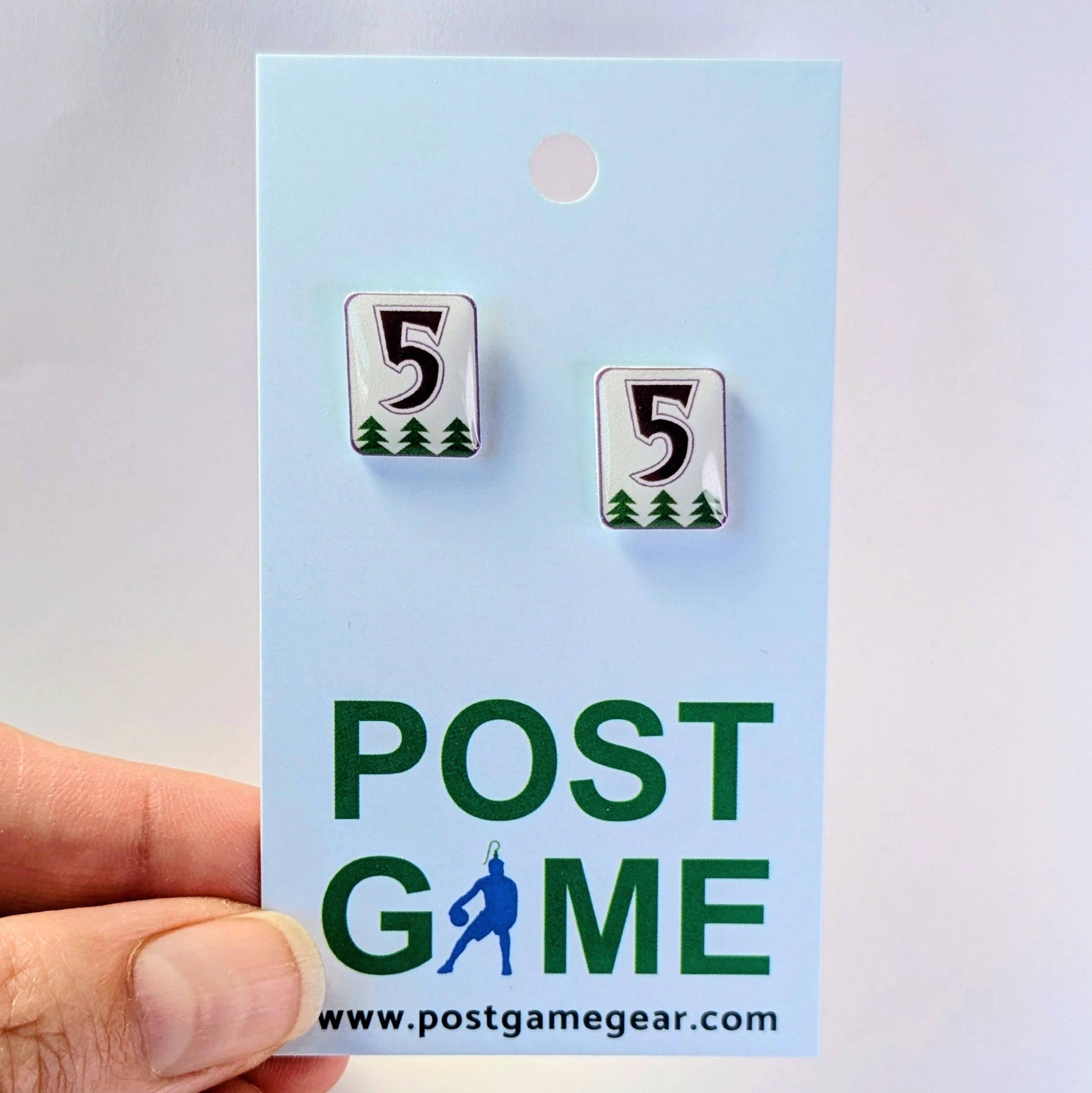 Pair of earrings with number 5 design on a 'POST GAME' branded card.
