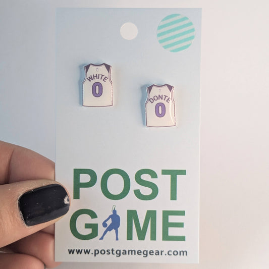 Two small basketball jersey earrings on a 'POST GAME' card.