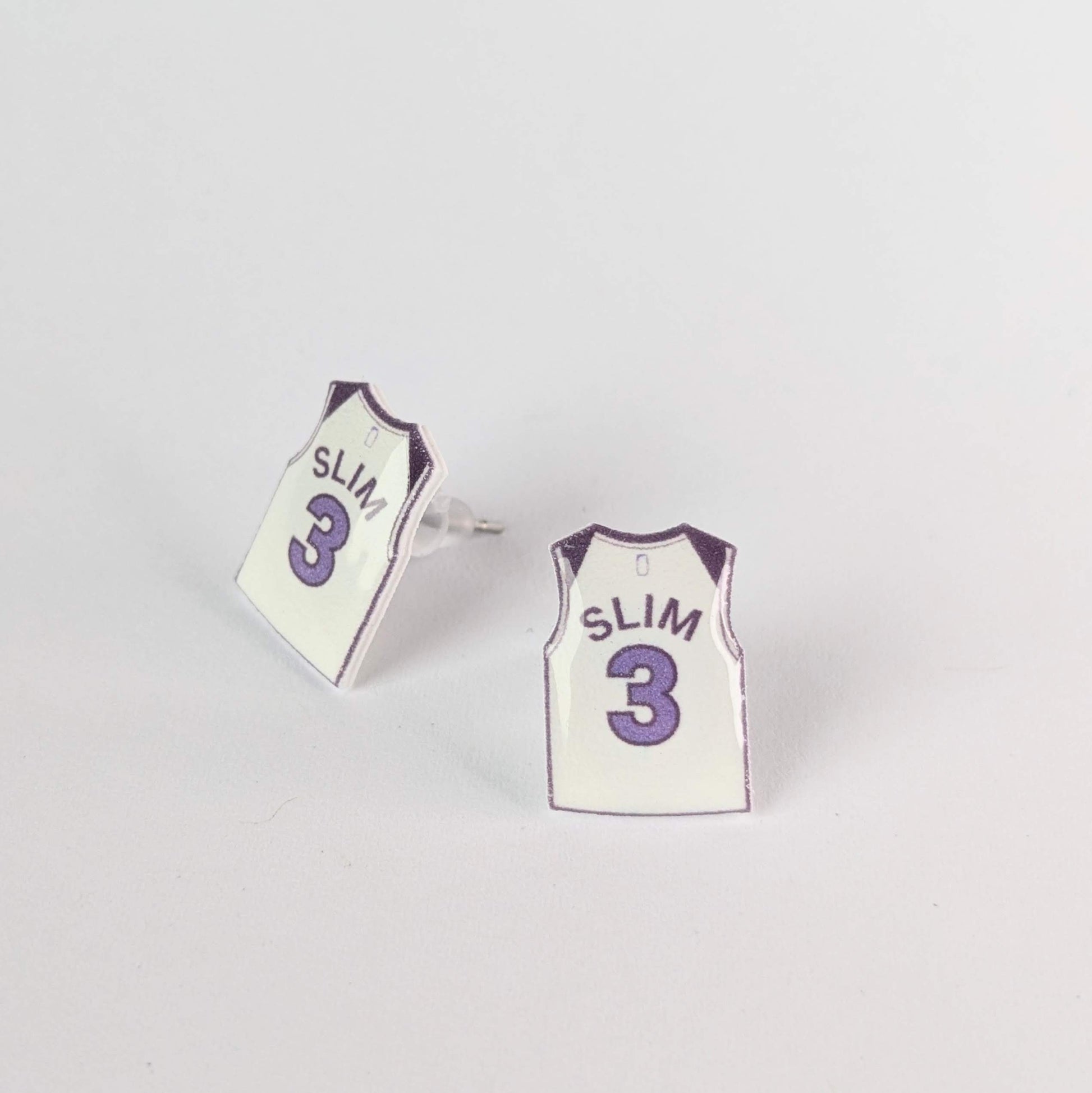 Basketball jersey earrings with 'SLIM' and number '3' on a light gray background