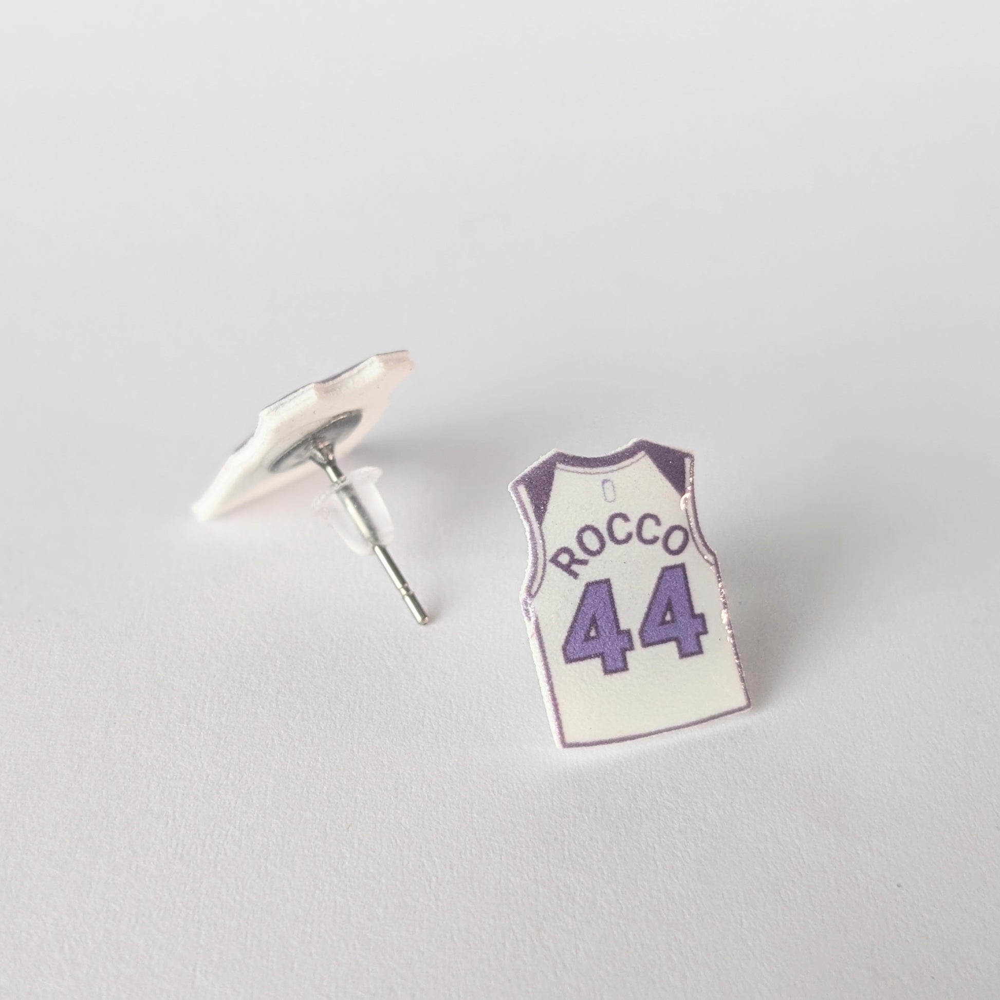 Basketball jersey earrings with 'Rocco' and number '44' on a light gray background