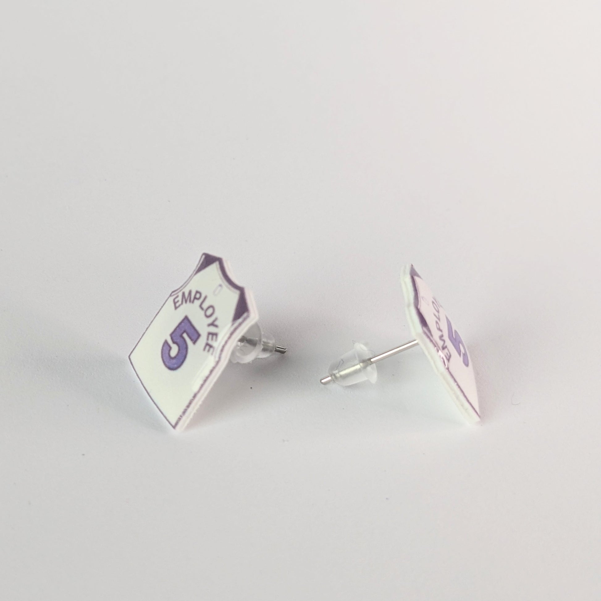 Pair of earrings with 'Employee 5' design on a light gray background