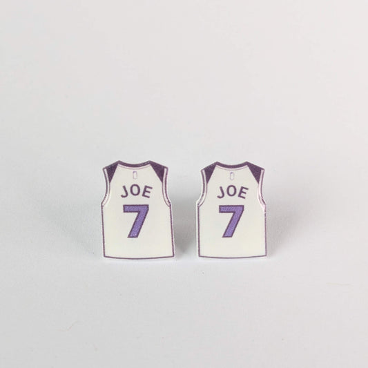 Two miniature basketball jerseys with 'JOE' and number '7' on a light gray background