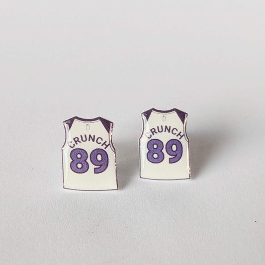 Two miniature basketball jerseys with 'CRUNCH' and number '89' on a light gray background